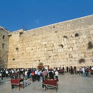 Israel, Jerusalem, People praying in front of Western Wall (Wailing Wall)