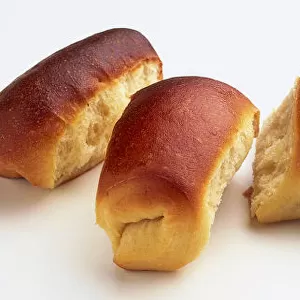 A line of Parker House rolls