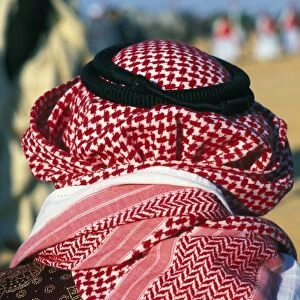 Man wearing a keffieh at the Douz Sahara festival