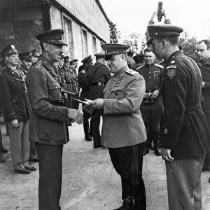 Marshal georgy zhukov meets general eisenhower and field-marshal montgomery and hands out orders and medals to officers of the american army, 1945, world war 2