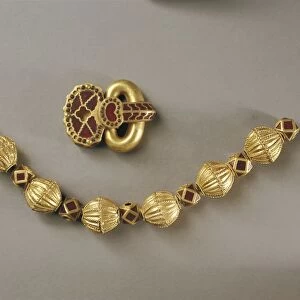 Romania, Apahida, Gold buckle and part of a gold necklace from the Omharus treasure, found in 1969