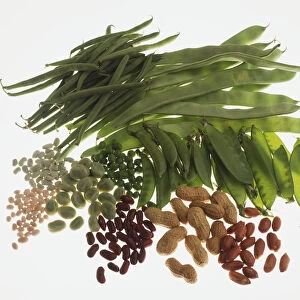 Selection of podded vegetables, including green beans, mangetout, hazelnuts, peas