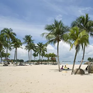 Singapore, Sentosa, people and palm trees on white sand Siloso Beach