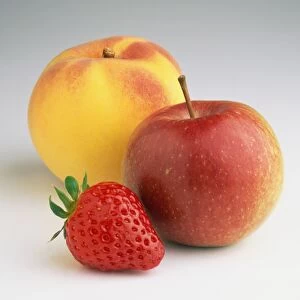 Single strawberry, apple and peach