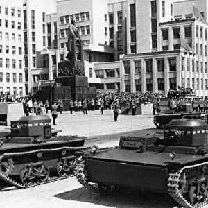 Soviet t-38 amphibious tanks during a military parade in minsk on may 1, 1939