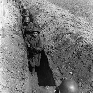 Soviet tommygunners passing along a communication trench before an attack on the soviet-german front, september 1942