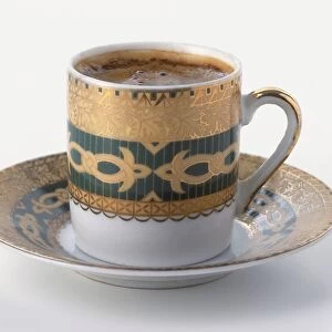 Turkish coffee served in a decorative cup and saucer