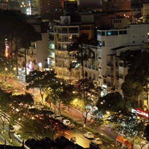 Vietnam, Ho Chi Minh City, Le Loi Street illuminated at night