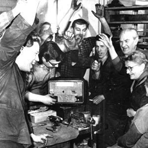 The workers of the ckd sokolovac engineering works in prague listening to the first news of soviet cosmonaut yuri gagarins flight, 1961