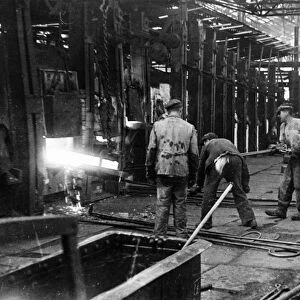 Workers of the krasny oktyabr iron and steel works back at work at the restored plant in stalingrad, ussr, 1940s