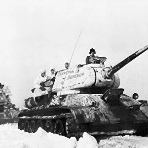 World war 2, soviet t-34 tanks in snow, front tank is named dimitry donskoy