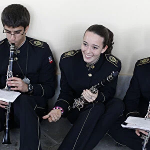 Young musicians getting ready for an Easter week procession