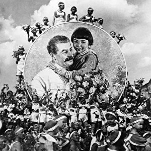 A young pioneers sports festival in 1937, in the background is an image of joseph stalin with engelsina (gelya) markizova