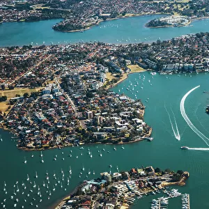 aerial view of cityscape in Sydney, buildings and river, lake, bay