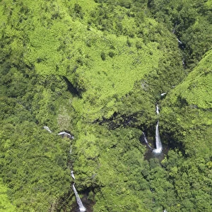 Aerial of forested mountains and waterfalls, Kauai, Hawaii, USA