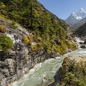 Ama Dablam mountain peak and small river, Everest region