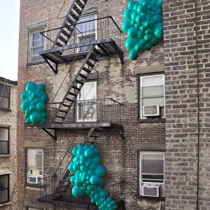 Balloons popping out through windows