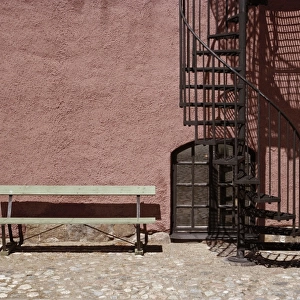 Bench and spiral staircase