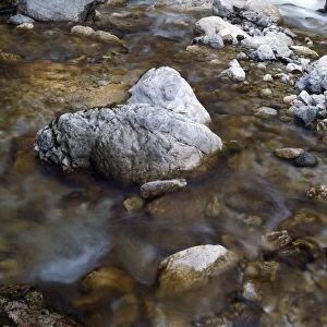 Boulders and rocks in the river bed of the Soca river, Soca Valley near Trenta, Triglav National Park, Slovenia, Europe
