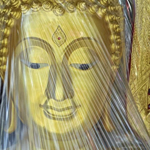 Buddha statue covered with plastic foil, produced in a small factory, Bamrung Muang Road, Bangkok, Thailand, Asia, PublicGround