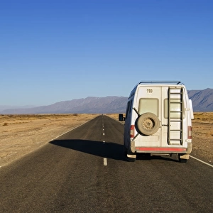 camper van on a road outside cafayate