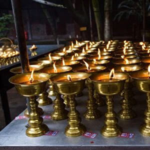 Candles in a temple, LeShan, SiChuan, China