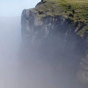 Clouds on the cliffs, Mykines, Utoyggjar, Faroe Islands, Denmark