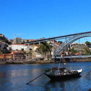 Dom Luis I bridge and rabelo boats in Porto