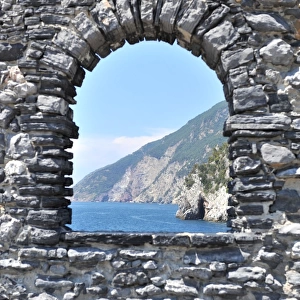 Fairytale arched window facing the sea