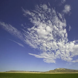 Fantastic clouds over farm fields, fall, Montana