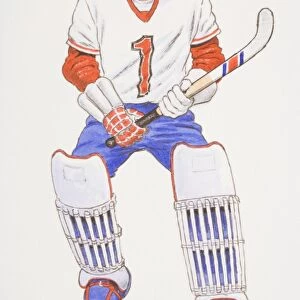 Hockey goalkeeper wearing helmet and knee pads holding a hockey stick, front view