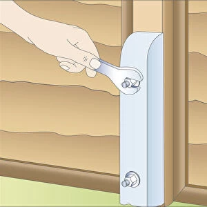 Illustration of using spanner to fasten spur to wooden fence post with galvanized bolt