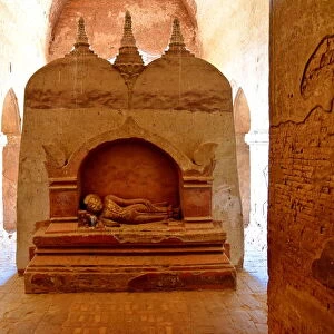 Inside Dhamma Yan Gyi with stone buddha sculpture Temple, Bagan, unesco ruins Myanmar. Asia