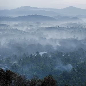 Morning fog over a hilly landscape, Ngapali Beach, Thandwe, Myanmar