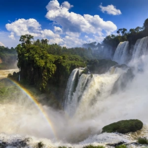 Panorama of the Iguazu waterfalls with rainbow