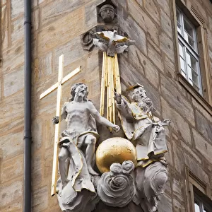 Religious Sculpture On The Corner Of An Old Building