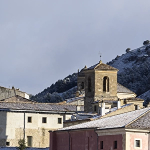 Sight of the old town of basin with the covered with snow roofs