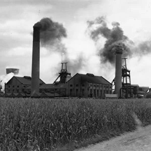 Smoke rising from the chimneys of the main colliery at Askern, Yorkshire