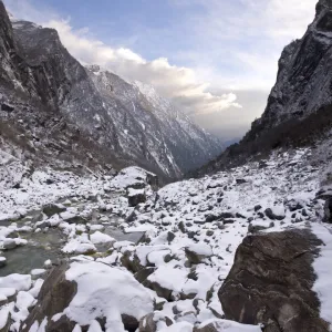 Snow in rocky mountain valley