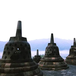 Stupas with background of mountains at Borobudur