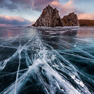 Sunset at the Rock Shamanka. Lake Baikal, winter