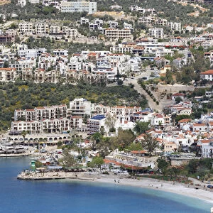 Townscape of Kalkan with beach, Kalkan, Lycia, Province of Antalya, Turkey