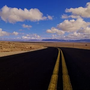 Usa, Nevada, Highway and Cumulus Clouds
