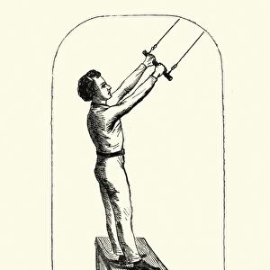 Victorian boy abouit to use a trapeze