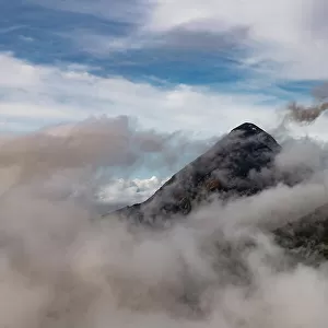 Volcan de Fuego with clouds around