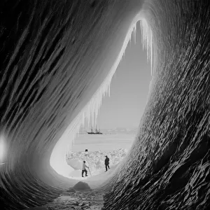 Grotto in an iceberg. Terra Nova in the distance. Taylor and Wright (Interior). January 5th 1911