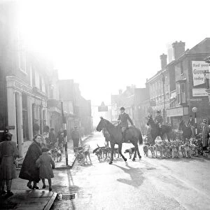 3 December 1952 Leading the fox hunt through Edenbridge High Street. Edenbridge