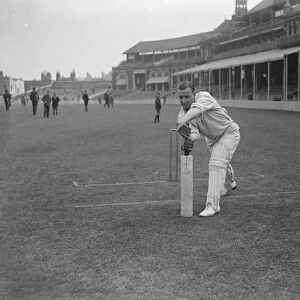 Barling, Surrey batsman. Playing forward, posed at wicket. 12 May 1928