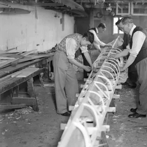 The Boat Race 1933 The Cambridge Boat under construction at Sims boathouse on 2