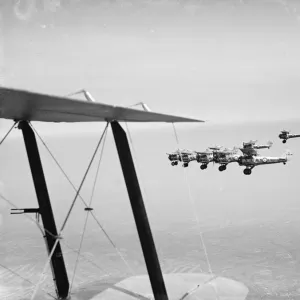 Bristol Bulldogs fighters of No 32 Squadron in formation flying over Biggin Hill